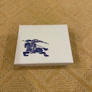 Burberry Box 6.5 inches by 5 inches
Comes with a pouch for the wallet and tags
